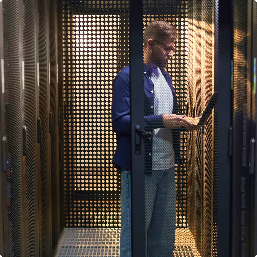 Technician working in a server room